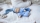 Minischlamperle hellblau mit gestreifter Mütze 22 cm